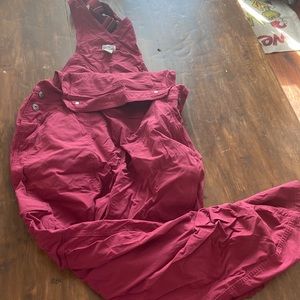 Duluth raspberry colored garden overalls